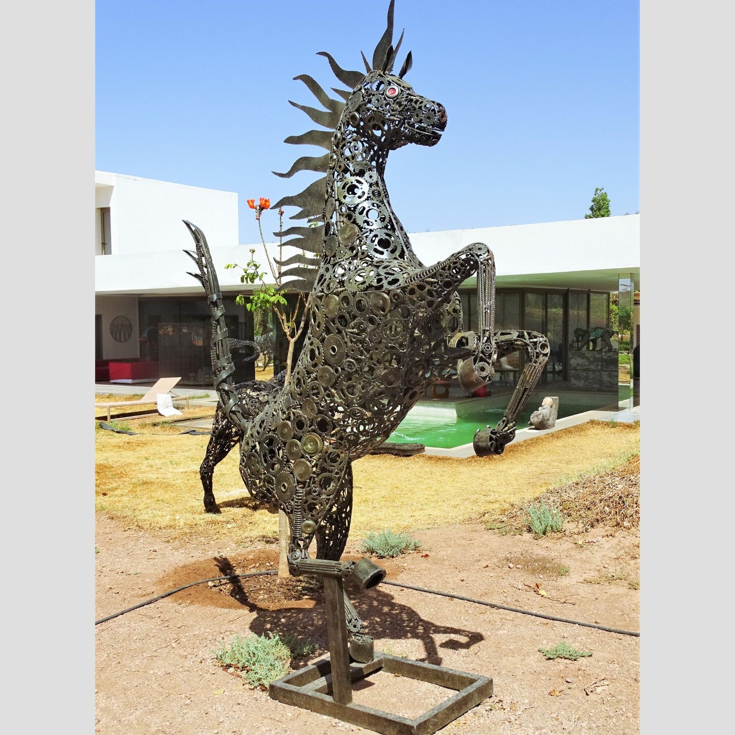 sculpture metal jardin, logo ferrari, ferrari logo, logo cheval, logo voiture cheval, logo cheval voiture, cheval ferrari, cheval cabré ferrari,Sculpture en metal , cheval de metal, cheval mécanique, cheval mecanique, tete de cheval, statue cheval extérieur, statue cheval jardin, sculpture animaux, tête de cheval, sculpture cheval, statue cheval, cheval cabré, statue cheval, cheval cabre, sculpture cheval, cheval de metal, decoration cheval, sculpture metal.