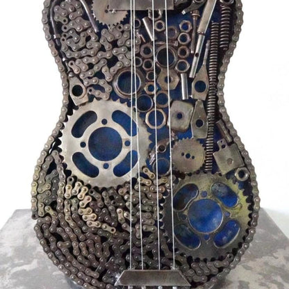 Sculpture en metal, guitare en metal, guitare en métal, guitare métallique, guitare déco, guitare mur deco, guitare mur, guitare decorative, guitare décoration murale, guitare décoration, decoration guitare, guitare pour metal, guitare métal, guitar metal, guitare electrique metal, deco guitare murale, deco guitare.