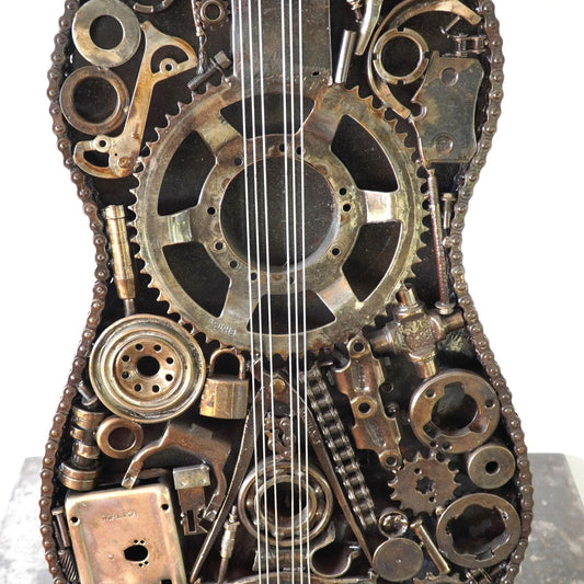 Sculpture en metal, guitare en metal, guitare en métal, guitare métallique, guitare déco, guitare mur deco, guitare mur, guitare decorative, guitare décoration murale, guitare décoration, decoration guitare, guitare pour metal, guitare métal, guitar metal, guitare electrique metal, deco guitare murale, deco guitare.