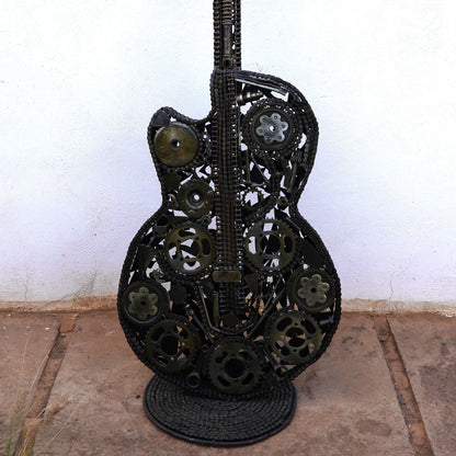 Sculpture en metal, guitare en metal, guitare en métal, guitare métallique, guitare déco, guitare mur deco, guitare mur, guitare decorative, guitare décoration murale, guitare décoration, decoration guitare, guitare pour metal, guitare métal, guitar metal, guitare electrique metal, deco guitare murale, deco guitare.