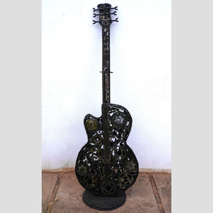 Sculpture en metal, guitare en metal, guitare en métal, guitare métallique, guitare déco, guitare mur deco, guitare mur, guitare decorative, guitare décoration murale, guitare décoration, decoration guitare, guitare pour metal, guitare métal, guitar metal, guitare electrique metal, deco guitare murale, deco guitare.